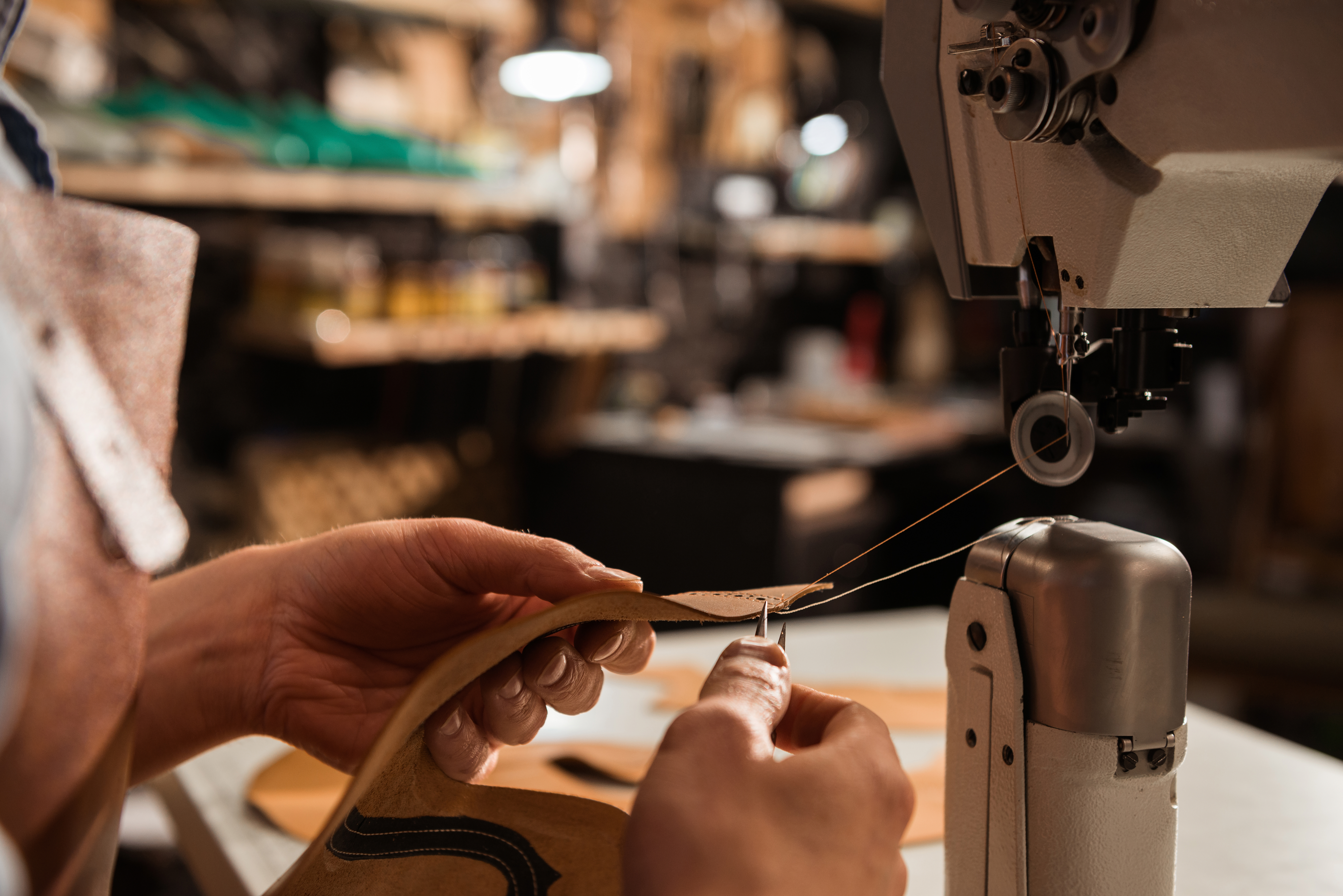 Close-up shoemaker using sewing machine